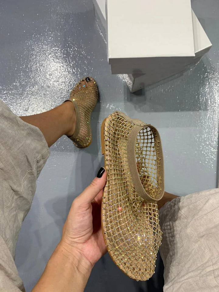 Sandali brillanti alla moda 